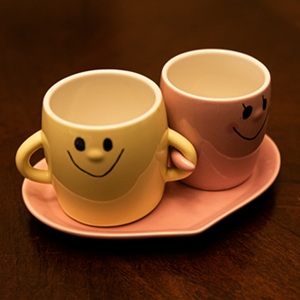 Yellow and pink pair mugs
